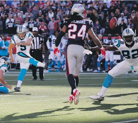  ?? JIM ROGASH/GETTY IMAGES ?? Carolina Panthers kicker Graham Gano boots a 48-yard field goal as time expires in the fourth quarter to defeat the New England Patriots 33-30 on Sunday in Foxborough, Mass. “We have a great football team,” Gano said after the game, “and I feel like we...