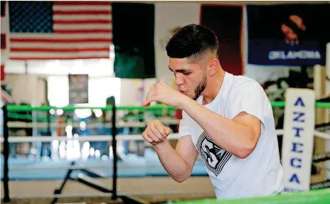  ?? [PHOTO BY SARAH PHIPPS, THE OKLAHOMAN] ?? Alex Saucedo, who learned the ropes at Azteca Boxing Club in Oklahoma City, returned for a workout on May 17. “This is where it starts,” said famed trainer Abel Sanchez. “Without the gyms, without the coaches, we wouldn’t have any superstars.”