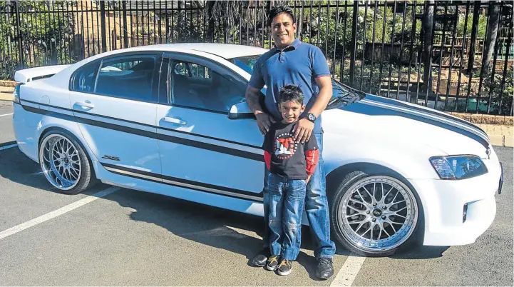  ?? Pictures: KATHERINE MUICK-MERE ?? FAST AND FURIOUS: Raymond Debipersad and his son, Josh, with their Chevrolet Lumina SS, which grabs a lot of attention with its sleek body