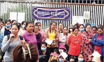  ?? CATU ?? Yang Sophorn (front left) at a protest in Phnom Penh.