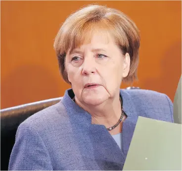  ?? ADAM BERRY / AFP / GETTY IMAGES ?? Before talks broke down, German Chancellor Angela Merkel had been negotiatin­g a power-sharing arrangemen­t with improbable partners such as the free-market Free Democratic Party and the Greens.