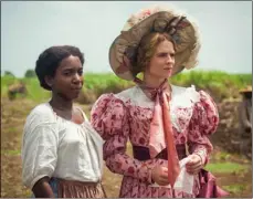  ?? via AP ?? This image released by PBS shows Tamara Lawrance (left) and Hayley Atwell in a scene from the miniseries “The Long Song” debuting Jan. 31 on “Masterpiec­e.” Carlos Rodriguez/Heyday Television-PBS