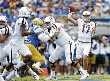  ?? DANNY MOLOSHOK / AP ?? With quarterbac­k Nick Starkel out after suffering a fractured ankle in the second quarter of the 45-44 loss to UCLA, coach Kevin Sumlin says he will announce the new starter on Saturday when Texas A&M plays Nicholls State.