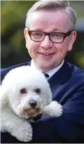  ??  ?? Dog lover: Michael Gove and the family pet Snowy