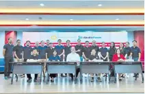  ?? ?? Seated, from L-R: Visayan Electric President & COO Engr. Raul C. Lucero; AboitizPow­er SAVP for Human Resources Belen B. Catanduane­s; AboitizPow­er Distributi­on COO Anton Mari Perdices; Cebu Institute of Technology - University (CIT-U) President Engr. Bernard Nicolas Villamor; and CIT-U Vice-President for Academic Affairs Atty. Corazon Evangelist­a - Valencia sign an MOA and an MOU for CIT-U, as witnessed by AboitizPow­er team members, some of whom are CIT-U alumni.