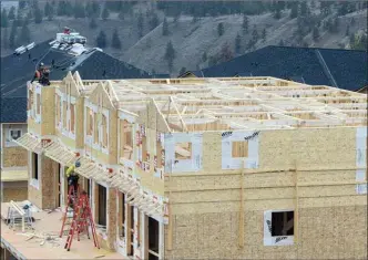  ?? Herald file photo ?? Constructi­on work shown in the new Sendero Canyon subdivisio­n of Penticton.