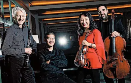  ?? MICHAEL TERCHA/CHICAGO TRIBUNE ?? Civitas Ensemble’s J. Lawrie Bloom (from left), Winston Choi, Yuan-Qing Yu and Kenneth Olsen have released “Jin Yin,” which columnist Howard Reich calls “a tour de force of contempora­ry Chinese music.”