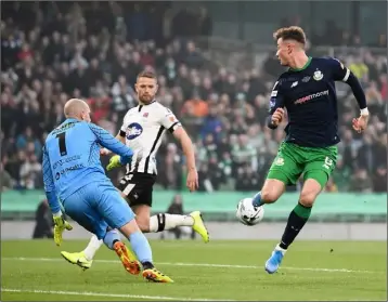  ??  ?? Ronan Finn of Shamrock Rovers has an attempt on goal.