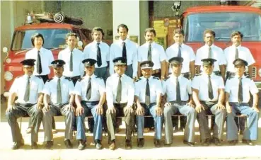  ?? ?? Front, fourth from left: Tula Ram Jaduram with his team of fire officers in Labasa.