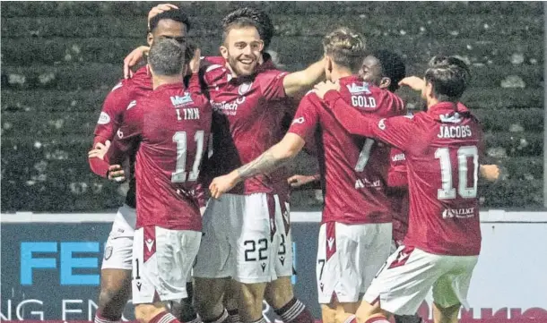  ?? ?? MAKING A POINT: David Gold celebrates after scoring his first goal since March – one he had been planning before Saturday’s fixture.