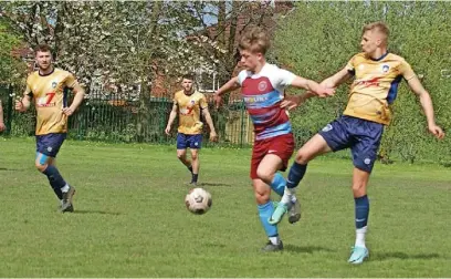  ?? ?? ●●Action from Bollington’s (in yellow) clash against Richmond Rovers