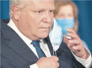  ?? FRANK GUNN THE CANADIAN PRESS FILE PHOTO ?? Ontario Premier Doug Ford has turfed two MPPs from caucus for defying him on the pandemic.