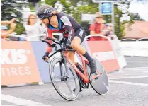  ?? Photo / Getty Images ?? Patrick Bevin’s BMC team won the team time trial by 4s ahead of Chris Froome’s Team Sky.