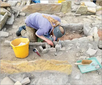  ??  ?? „ The large formal hearth under excavation at The Cairns increasing­ly known for a post-broch metal working area 60 metal working moulds.