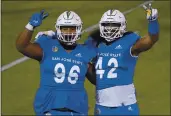  ?? JOHN LOCHER — THE ASSOCIATED PRESS, FILE ?? San Jose State defensive lineman Jay Kakiva (96) and defensive end Viliami Fehoko (42) celebrate during their Dec. 11 game against Nevada in Las Vegas.