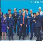  ?? AFP ?? MUJERES EN EL G20. Con la ausencia de Merkel en la foto oficial, la presenciaf­emenina se reduce a May y Lagarde.