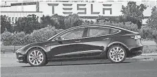  ?? TESLA ?? A new Tesla can be pricey, but a used one could save you dough.