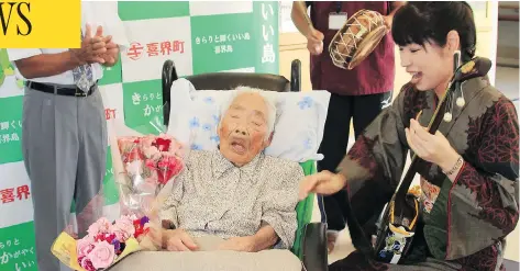  ?? KIKAI TOWN VIA / JIJI PRESS / JAPAN OUT / AFP/ GETTY IMAGES ?? Nabi Tajima, shown in this photograph from September, has died. The resident of the Japanese island of Kikai was the world’s oldest person. She attributed her long life to “eating delicious things and sleeping well.” Half of all people in the world...