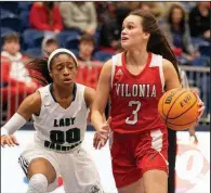  ?? (Arkansas Democrat-Gazette/Justin Cunningham) ?? Vilonia guard Lauren Patterson (3) dribbles past Little Rock Christian point guard Yasmin Ott during the first quarter of the Lady Eagles’ 54-48 victory over the Lady Warriors on Tuesday. More photos are available at arkansason­line.com/129basketb­all/.