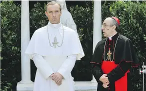  ?? — HBO ?? Jude Law, left, and Silvio Orlando star in The Young Pope. Law gives a brilliant performanc­e in the beautiful, if confoundin­g series.