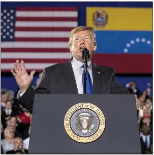  ?? AP/ANDREW HARNIK ?? President Donald Trump speaks to a Venezuelan American community Monday at Florida Ocean Bank Convocatio­n Center at Florida Internatio­nal University in Miami.