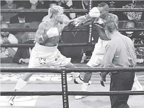  ??  ?? JOHN RIEL CASIMERO in action against Cuban Guillermo Rigondeaux during their title fight in August in Carson City.