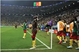  ?? Photograph: Dylan Martinez/Reuters ?? Cameroon’s Vincent Aboubakar celebrates scoring his late winner against Brazil.