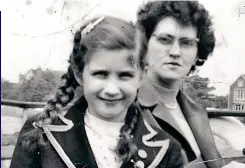  ?? ?? INNOCENT TIMES: Jenni as a schoolgirl with her mother