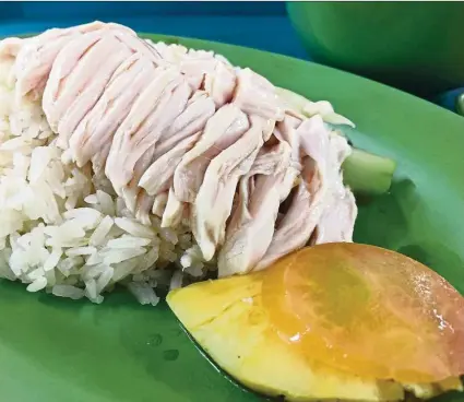  ??  ?? se Boneless Chicken Rice – don’t be deceived by what may look like a plate of bland chicken rice.