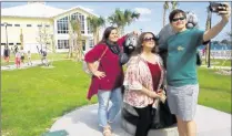  ?? CONTRIBUTE­D ?? Melody Pittman of Vero Beach takes a selfie with her daughter and son-in-law at Manatee Lagoon in West Palm Beach. County tourism leaders are using real-life photos in a new ad campaign.