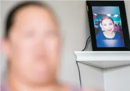  ?? Picture: AFP ?? ROBBED OF LIFE. A photo of Makayla Cox is displayed as her mother Shannon Doyle speaks at her home in Virginia Beach.
