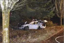  ?? CORVALLIS POLICE DEPARTMENT ?? An Oregon man crashed a Tesla while going about 100mph, destroying the vehicle, a power pole and starting a fire when some of the hundreds of batteries from the vehicle broke windows and landed in residences in Corvallis, Ore.