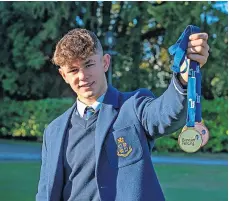  ?? ?? Medal joy Fencer Joshua Bryden