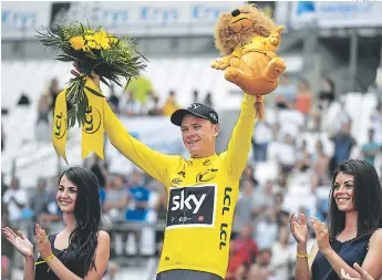  ?? FOTOS: AFP ?? “Ha sido el Tour más equilibrad­o de los que he ganado”, dijo el británico Chris Froome.