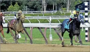  ?? DAVID M. JOHNSON — DJOHNSON@ DIGITALFIR­ST MEDIA.COM ?? Picco Uno, with Irad Ortiz Jr. up, pulls away from the field to win the $100,000 Union Avenue Stakes Thursday, Aug. 17, 2017at Saratoga Race Course.