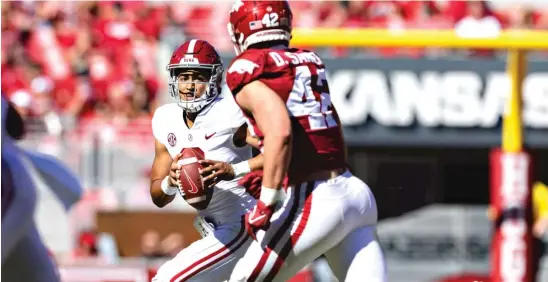  ?? GETTY IMAGES ?? Alabama quarterbac­k Bryce Young suffered a sprained right shoulder early in the second quarter Saturday against Arkansas and sat out the rest of the game.