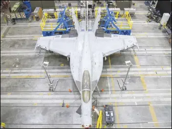  ?? PHOTO COURTESY OF NASA ARMSTRONG FLIGHT RESEARCH CENTER ?? The Flight Loads Lab at NASA Armstrong Flight Research Center at Edwards Air Force Base recently completed extensive structural loads testing on a Navy F/A-18 Super Hornet so that it may be used for the service’s future flight testing needs.