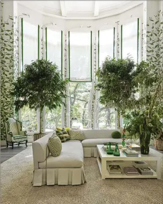  ?? COURTESY OF JAY SIMON OF TEN TEN CREATIVE ?? It’s hard to imagine a room that better illustrate­s the tenets of biophilia than Chicago designer Alessandra Branca’s living room for the 2022 Kips Bay Dallas Show House, which combines ample light, plants, green accessorie­s and botanical wallpaper to create the sensation of living in a forest.