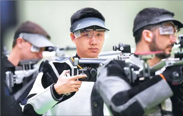  ?? PHOTOS PROVIDED TO CHINA DAILY ?? Yang Haoran nailed golds in the men’s 10m air rifle and the 50m rifle 3 positions at the 13th Chinese National Games.