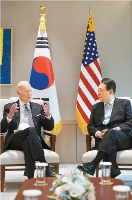  ?? Yonhap ?? President Yoon Suk-yeol and U.S. President Joe Biden hold talks at the presidenti­al office in Yongsan District, Saturday. The U.S. leader has become the first foreign head of state to visit the new presidenti­al office following the closing of Cheong Wa Dae as the executive office and official residence of the President of Korea on Yoon’s May 10 inaugurati­on.