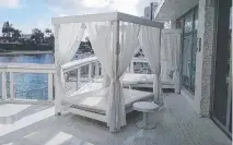  ??  ?? Items listed on Facebook for sale include curtained daybeds.