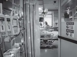  ?? ERIN SCHAFF The New York Times ?? A nurse checks on a COVID-19 patient at Houston Methodist Hospital on July 5. The Trump administra­tion recently ordered hospitals to stop sending coronaviru­s patient data to the Centers for Disease Control and Prevention.