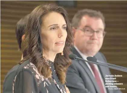  ?? Photo / Mark Mitchell ?? Jacinda Ardern and Grant Robertson — picking winners and losers.