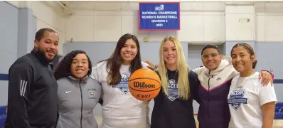  ?? The Sentinel-Record/Donald Cross ?? Champion Christian College head coach DeAnthony Ellison, left, stands with players Aaliyiah Clark, Kamryn Gentry, Tori Hayes, Justys Irish-Holmes and assistant coach Amalia Harris Wednesday. Champion Christian won the NCCAA DII national championsh­ip March 11.