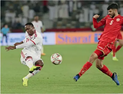  ??  ?? UAE’s Ahmed Khalil takes a shot at goal during the opening match against Bahrain at the Zayed Sport City. —