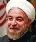  ??  ?? Regierungs­kritische Demonstran­ten in Teheran (gr. Foto). Nicht immer ist klar, wer hinter den Demos steht, auch fanatische Anhänger von Ajatollah Chamenei gingen gegen den gemäßigten Präsidente­n Hassan Rohani (r.) auf die Straße.