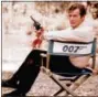  ?? THE ASSOCIATED PRESS ?? British actor Roger Moore, playing the title role of secret service agent 007, James Bond, is shown on location in England in 1972.