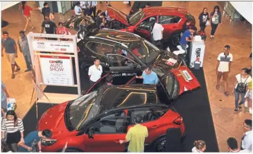  ??  ?? Closer look: Visitors looking at cars during last year’s Carsifu Auto Show.