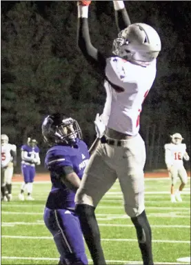  ?? / Contribute­d by Gail Conner ?? Cedartown’s Zahquan Frazier goes up for a pass against the Chapel Hill defense.