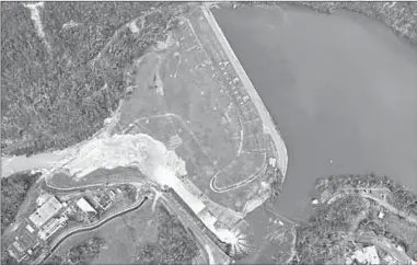  ??  ?? An aerial view shows the damage to the Guajataca dam in the aftermath of Hurricane Maria.